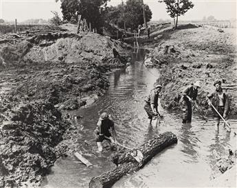 (NEW DEAL PROGRAMS: CCC BOYS) A group of 10 photographs depicting the Civilian Conservation Corps.